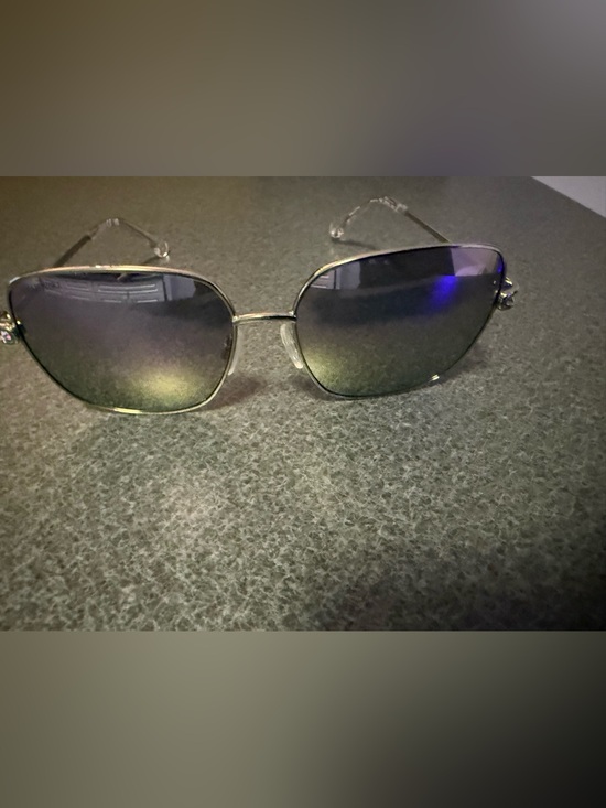 Swarovski Accessories - Swarovski Blue Silver Rimless Sunglasses